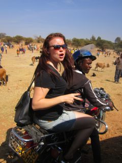 Alana riding a piki-piki in Kondoa, Tanzania. 