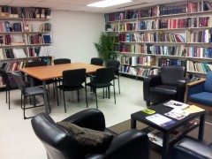 View of Chet Mitchell Law Resource Centre with workspaces and book shelves