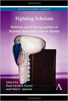 Book cover image_white boxing glove balanced on a book